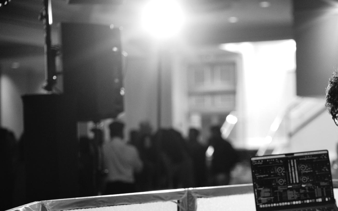 Event room and crowd atmosphere during an XME DJ performance